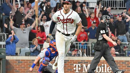 October 2, 2022 Atlanta - Atlanta Braves' first baseman Matt Olson (28) hits a solo home run in the 6th inning at Truist Park on Sunday, October 2, 2022. (Hyosub Shin / Hyosub.Shin@ajc.com)