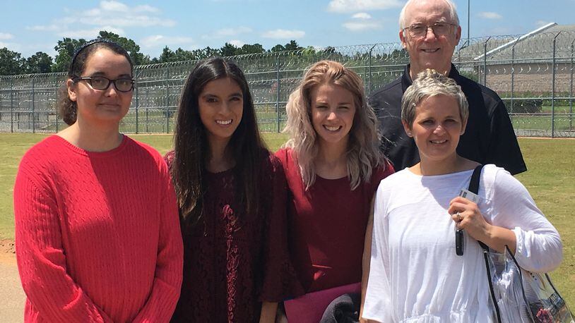 Professors Ronald H. Aday and Meredith Huey Dye stand with graduate students Mary De La Torre (from left), Nicole Cook and Alisha Wray outside Pulaski Women’s Prison in Georgia. CONTRIBUTED