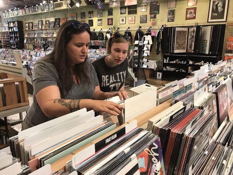 Amanda Ellis, 36, of Tampa, with her 19-year-old daughter Samantha, recently visited Criminal Records, inspired by musician Butch Walker. CREDIT: Rodney Ho/rho@ajc.com