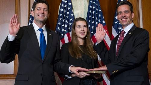 House Speaker Paul Ryan of Wis. administers the House oath of office to Rep. Tom Graves, R-Ga., during a mock swearing in ceremony on Capitol Hill in Washington, Tuesday, Jan. 3, 2017, as the 115th Congress began. (AP Photo/Jose Luis Magana)