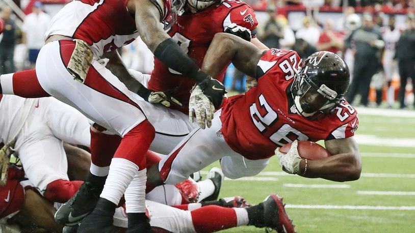 November 27, 2016, Atlanta: Falcons running back Tevin Coleman dives into the endzone for a touchdown and a 24-13 lead over the Cardinals during the third quarter in an NFL football game on Sunday, Nov. 27, 2016, in Atlanta. Curtis Compton/ccompton@ajc.com