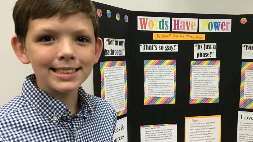 Bennett Stone with his “Love Notes” display at his school in Roswell. Bennett’s idea to write notes of encouragement to transgender students inspired the nonprofit Georgia Equality to launch a campaign encouraging others to write notes. CONTRIBUTED