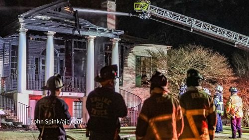 A fire destroyed Stone Mountain Park's historic Dickey House early Tuesday morning.