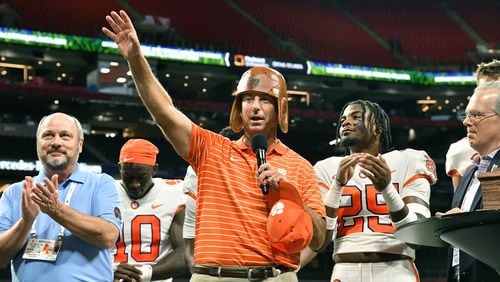Clemson coach Dabo Swinney celebrates the team's victory over Georgia Tech in the 2022 Chick-fil-A Kickoff game at Mercedes-Benz Stadium in Atlanta on Monday, Sept. 5, 2022.  (Hyosub Shin/The Atlanta Journal-Constitution/TNS)