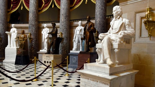 A statue of Alexander Hamilton Stephens, the Confederate vice president throughout the Civil War, has been on display in the Statuary Hall at the U.S. Capitol since 1927, A number of top politicians in Georgia have joined in a bipartisan effort to replace it with a likeness of the late U.S. Rep. John Lewis. (AP Photo/Susan Walsh, File)