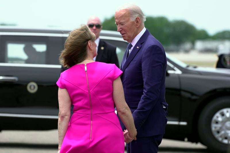 President Joe Biden greets Rep. Kathy Castor, D-Fla., as he arrives at Tampa International Airport, in Tampa, Fla., Tuesday, April 23, 2024. (AP Photo/Manuel Balce Ceneta)