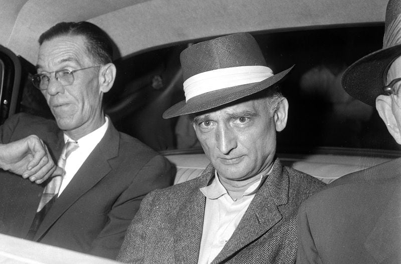 William Fisher, better known by his alias Rudolf Abel, center, was a Soviet spy operating in New York in the 1950s. He was captured as part of the FBI's Hollow Nickel Case and spent four years at the Atlanta Federal Penitentiary before being released to the Soviet Union. His release was part of a prisoner swap for Gary Powers, the American U-2 pilot shot down over the Soviet Union in 1960. The story was recounted in a 1964 book, which served as the basis for the 2015 Steven Spielberg film "Bridge of Spies," starring Tom Hanks. (Marty Lederhandler / AP file)