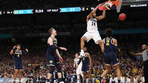 Spellman dunks in the NCAA Tournament title game.