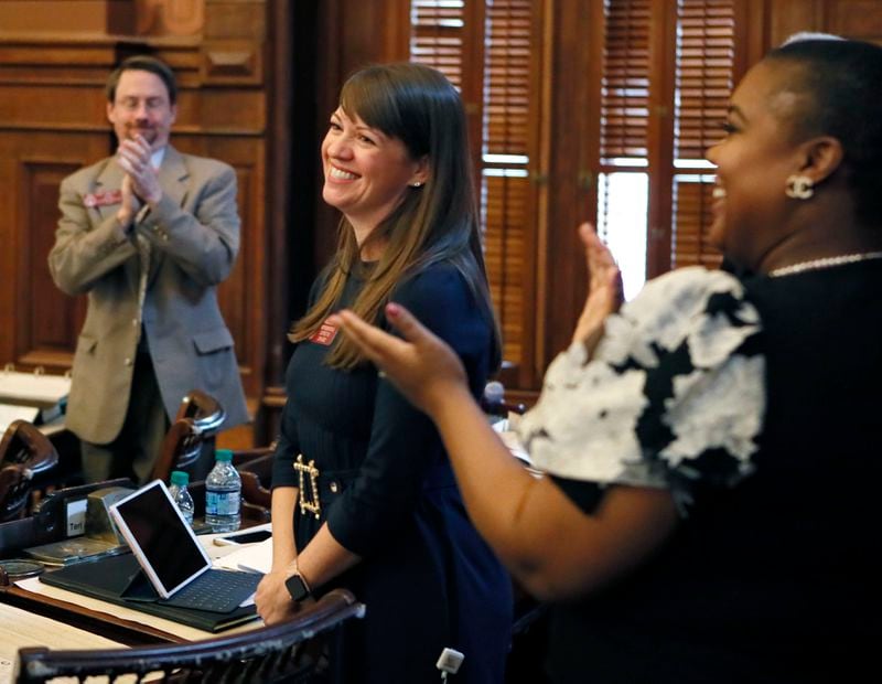 3/1/19 - Atlanta -  Rep. Teri Anulewicz, D - Smyrna, is congratulated after her first bill, HB 281, which would  increase the penalty provisions relating to pimping and pandering, passed the house, 147-4.  The legislature was in session for the 25rd day of the 2019 General Assembly.   Bob Andres / bandres@ajc.com