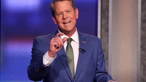 Republican Gov. Brian Kemp reacts to a question during the first debate of the GOP Republican primary for governor at the installations of WSB-TV in Atlanta. Sunday, April 24, 2022. Miguel Martinez /miguel.martinezjimenez@ajc.com