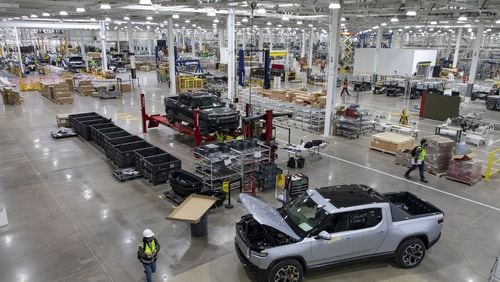 RT1 trucks are assembled and tested, April 14, 2021, before the new Rivian plant fully opens in Normal, Illinois. The company is now in negotiations with Georgia to locate a plant in the state that some suggest could come with 8,000 jobs. (Brian Cassella/Chicago Tribune/TNS)