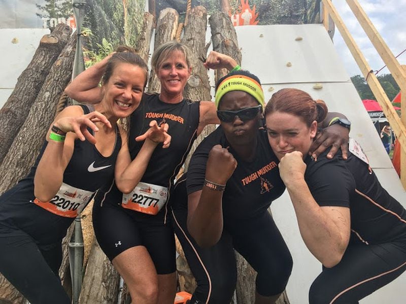 Mirna Valerio (second from right) gets rid of pre-Tough Mudder jitters with friends at the Atlanta Tough Mudder in April. Tough Mudder is a series of hardcore 10-12 mile obstacle race-mud run events designed to challenge the toughest of the tough. CONTRIBUTED