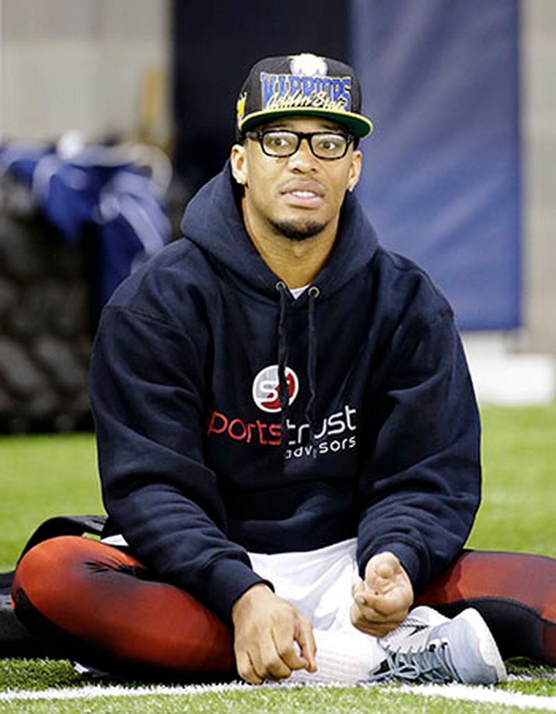 DeAndre Smelter sits on the sidelines while recovering from an injury during NFL Pro Day at Georgia Tech Friday, March 13, 2015, in Atlanta. (AP Photo/David Goldman) DeAndre Smelter sits on the sidelines while recovering from an injury. (AP)