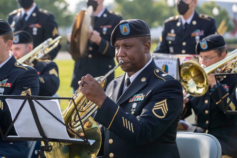 08/03/2021 —Fort Benning, Georgia — Members of the Fort Benning Maneuver Center of Excellence Band perform during a memorial dedication for Pvt. Felix Hall at Fort Benning, Tuesday, August 3, 2021. Hall, a Black soldier, was lynched at the base in 1941. (Alyssa Pointer/Atlanta Journal Constitution)