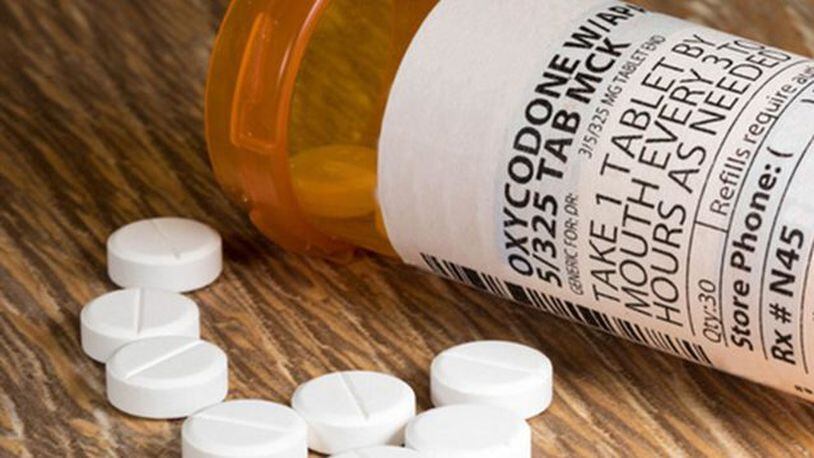 <p>One estimate says the nationwide economic toll from the opioid epidemic topped $1 trillion over the last 17 years. (Photo via The Atlanta Journal-Constitution)</p>