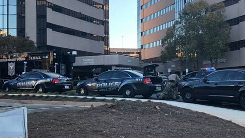 File photo. DeKalb police vehicles parked outside of Emory Decatur Hospital.