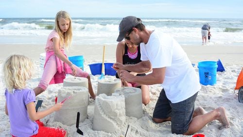 Go beyond the basic pail-and-shovel creation by signing up the whole family for a course at Sand Castle University. Contributed by Gulf Shores & Orange Beach Tourism