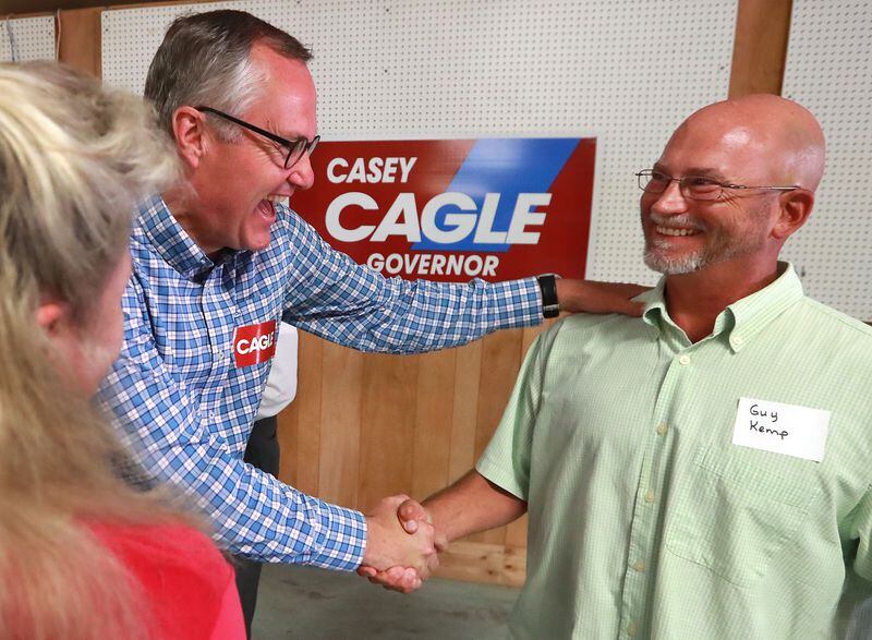 Lt. Casey Cagle is pleased to have the support of Guy Kemp, despite his last name, during Cagle’s gubernatorial campaign stop at the Madison Lions Club on Sunday, July 22, 2018, in Madison. (Photo: CURTIS COMPTON / ccompton@ajc.com)