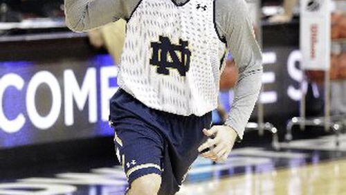 Notre Dame guard Pat Connaughton, one of the top two-sport college athletes in recent memory, will play in a NCAA tournament Sweet 16 game Thursday night. (ASSOCIATED PRESS)