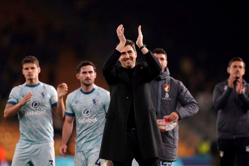 Bournemouth manager Andoni Iraola,front, applauds after the English Premier League soccer match between Wolverhampton Wanderers and Bournemouth in Wolverhampton, England, Wednesday, April 24, 2024. ( Joe Giddens/PA via AP)