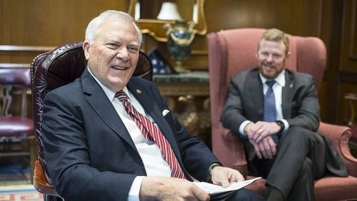 Gov. Nathan Deal, left, speaks about his two terms in Georgia’s top office as his chief of staff, Chris Riley, listens. (ALYSSA POINTER/ALYSSA.POINTER@AJC.COM)