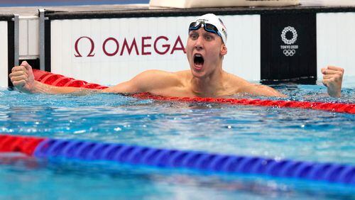 Chase Kalisz, of the United States, celebrates winning the final of the men's 400-meter individual medley at the 2020 Summer Olympics, Sunday, July 25, 2021, in Tokyo, Japan. (AP Photo/Martin Meissner)