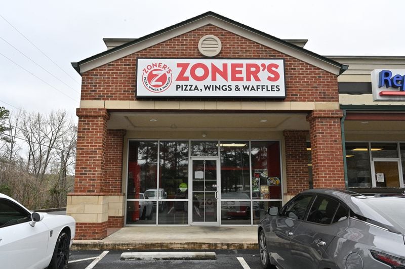 Herschel Walker has touted his involvement and ownership stake in Zoner’s Pizza, Wings and Waffles. The company, lists 15 locations, including this one in Macon. But recently Walker’s campaign has downplayed his role in the troubled company and called him a “minor investor.” (Hyosub Shin / Hyosub.Shin@ajc.com)