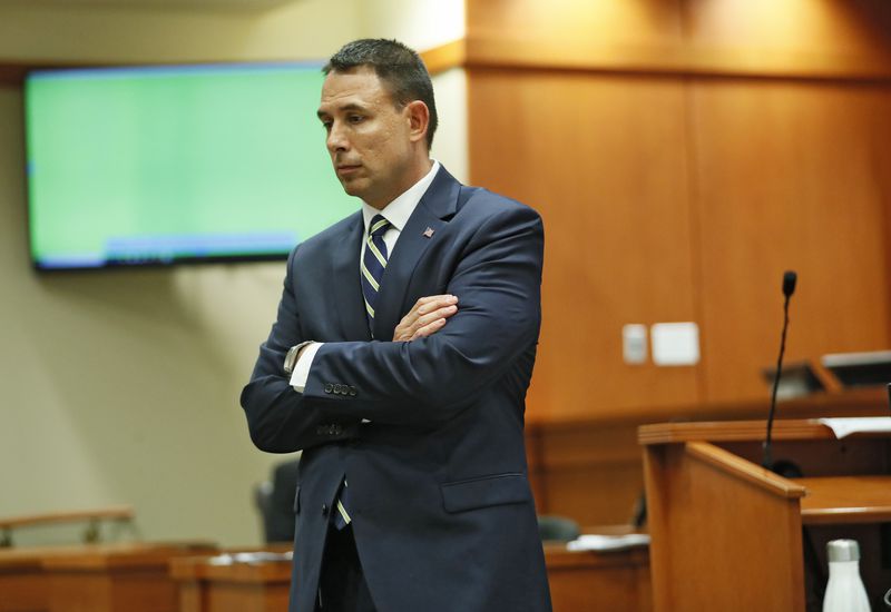 October 2, 2019 - Decatur - Prosecutor Pete Johnson waits for the next prosecution witness, DeKalb police officer Lyn Anderson, who arrived at the scene shortly after the shooting, to take the stand.   The murder trial of former DeKalb County Police Officer Robert "Chip" Olsen continued today.  Olsen is charged with murdering war veteran Anthony Hill.  Bob Andres / robert.andres@ajc.com