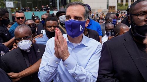 Los Angeles Mayor Eric Garcetti walks out to address protesters and clergy members in downtown Los Angeles outside of Los Angeles City Hall and LAPD Headquarters on Tuesday, June 2, 2020. (Kent Nishimura/Los Angeles Times/TNS)