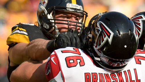 Pittsburgh Steelers outside linebacker Anthony Chickillo (56), left, battles with Atlanta Falcons offensive tackle Daniel Brunskill (76) in the first half of an NFL exhibition season football game, Sunday, Aug. 20, 2017, in Pittsburgh. (AP Photo/Don Wright)