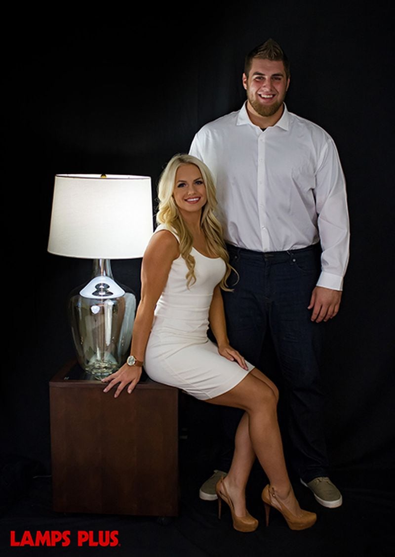 NFL prospect Forrest Lamp and his girlfriend, Natosha Boden, pose with Lamps Plus furnishings.