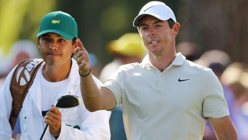 Rory McIlroy reacts to his drive on the 17th hole during his practice round for the Masters at Augusta National Golf Club on Tuesday, April 3, 2018, in Augusta.  Curtis Compton/ccompton@ajc.com