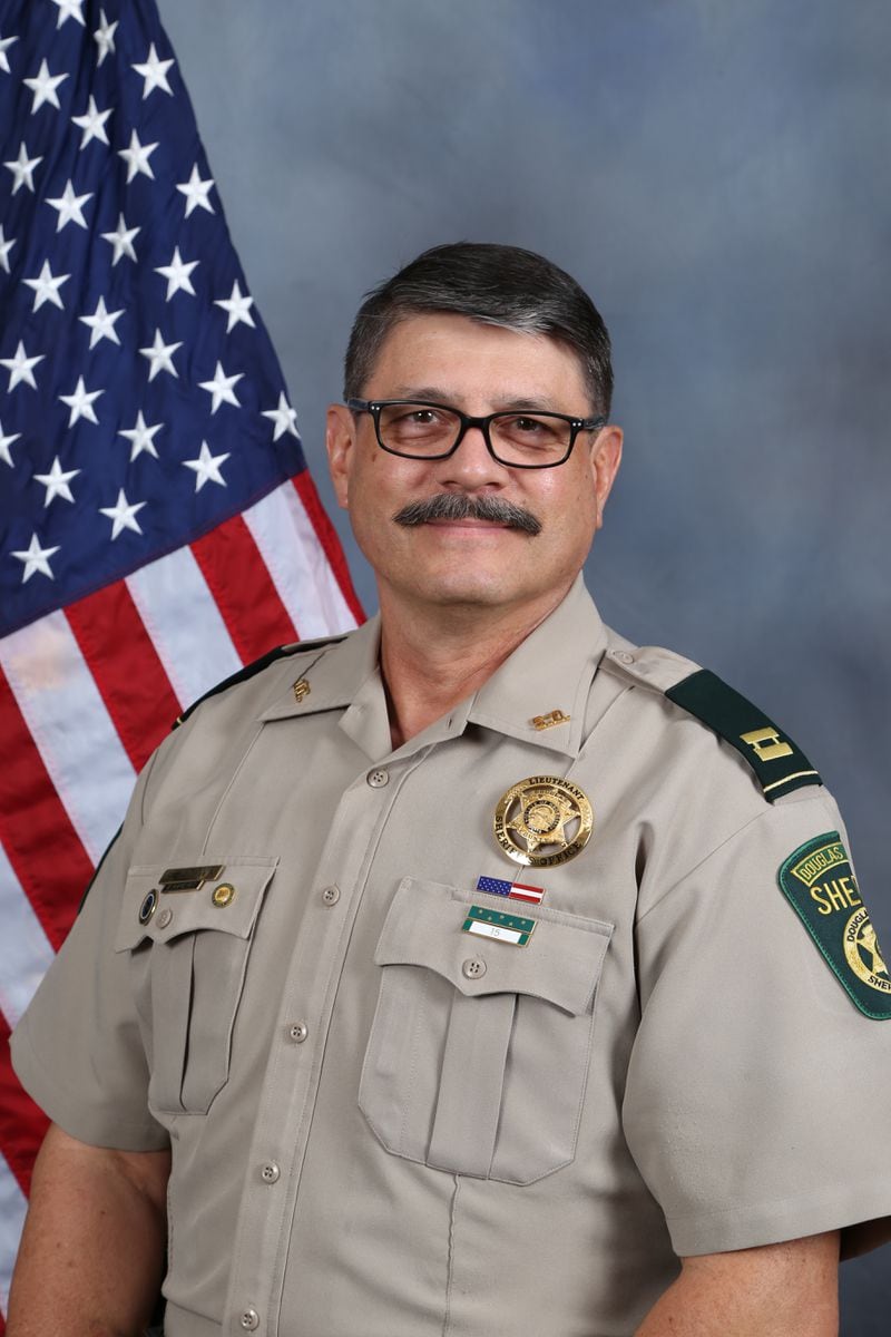 Retired Capt. Ross Brown of the Douglas County Sheriff's Office was released from the hospital Wednesday after surviving a seven-month battle against COVID-19.