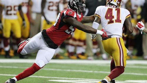 081116 ATLANTA: Falcons linebacker LaRoy Reynolds is called for a facemask penalty taking down Redskins safety Will Blackmon on a punt during the first quarter in an NFL preseason football game on Thursday, August 11, 2016, in Atlanta. Curtis Compton /ccompton@ajc.com
