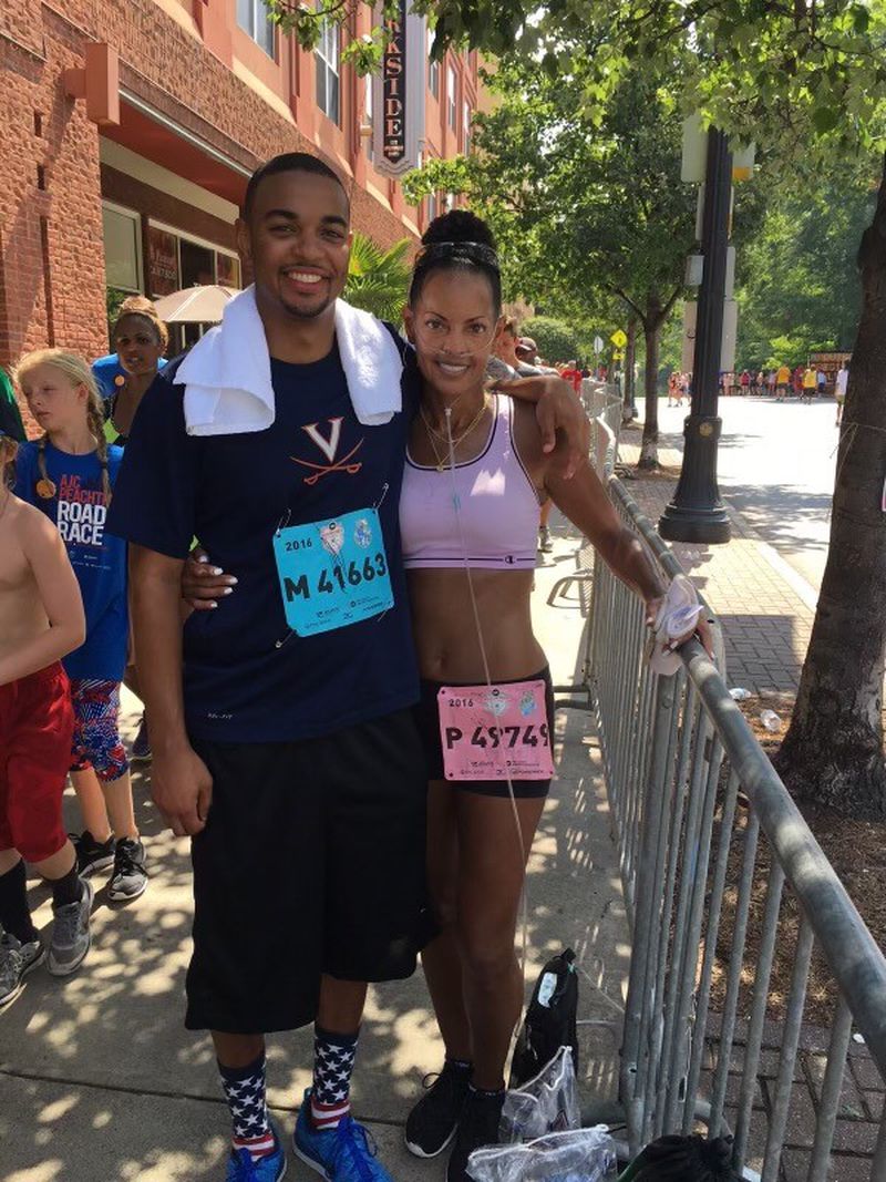 In 2016, Lovette Russell completed 3 miles of The Atlanta Journal-Constitution Peachtree Road Race with her son carrying her oxygen tank. She did the race again in 2017, but was only able to complete 1 mile. This year, after a double lung transplant, she completed the full race. (Courtesy of Lovette Russell)