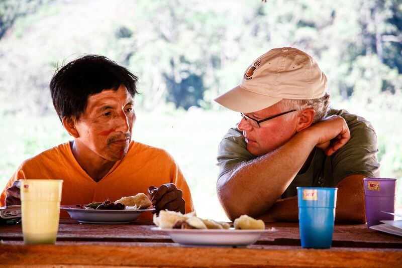  Bill Harris (right) talks with Don Julio of the CAC Pangoa farmers' co-op during at 2014 trip to Peru./ Scott Umstattd.