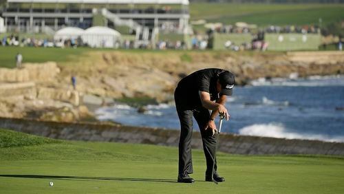 Phil Mickelson reacts after missing a birdie putt on the 18th green of the Pebble Beach Golf Links during the final round of the AT&T Pebble Beach National Pro-Am golf tournament Sunday, Feb. 14, 2016, in Pebble Beach, Calif. Vaughn Taylor won the tournament by one stroke over Mickelson. (AP Photo/Eric Risberg)