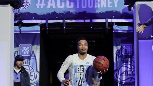 North Carolina guard Nate Britt runs onto the court before of an NCAA college basketball game against Duke during the semifinals of the Atlantic Coast Conference tournament, Friday, March 10, 2017, in New York. (AP Photo/Julie Jacobson)