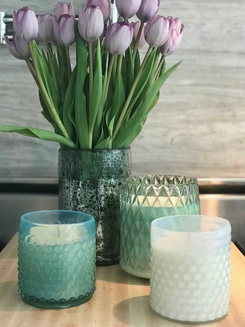 UNCOMMON SCENTS: Atlanta’s Teri Xerogeanes creates eco-chic candle collections that bring to mind a favorite getaway. Photo credit: WaxCandleBar.com