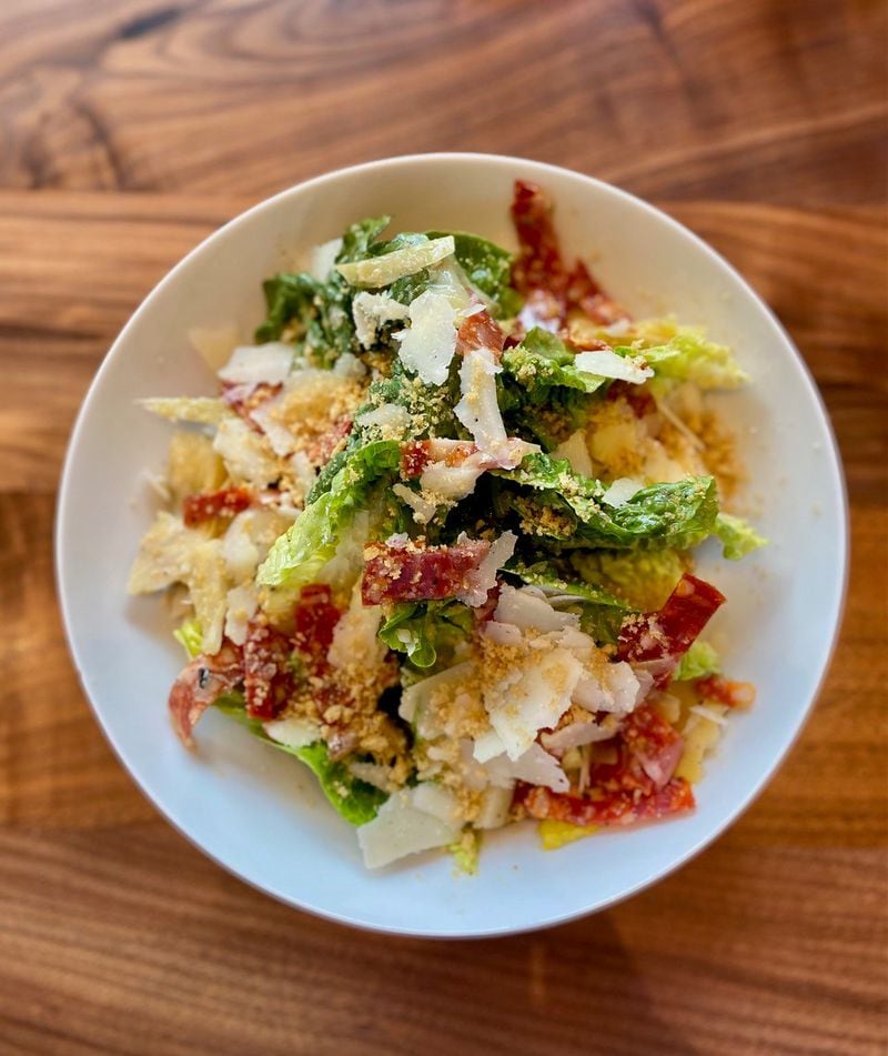 Lucian’s salad of little gem lettuce, salami, breadcrumbs and artichokes makes for a not-too-heavy lunch by itself. Wendell Brock for The Atlanta Journal-Constitution