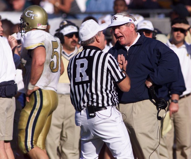 Tech coach George O'Leary argues with the referee after a unsportsmanlike call on a Jackets player.
