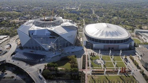 Construction continues on Mercedes-Benz Stadium, next door to the Georgia Dome. Aerial photo was shot on March 31. BOB ANDRES /BANDRES@AJC.COM