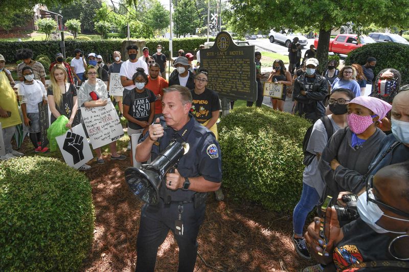 Kennesaw Police Chief Bill Westenberger speaks to a group of demonstrates across the street from a Confederate-era memorabilia shop, during a protest held Friday, June 5, 2020, in Kennesaw. Protests around the nation are occurring to sound off against the killing of George Floyd in Minneapolis police custody. JOHN AMIS FOR THE ATLANTA JOURNAL-CONSTITUTION