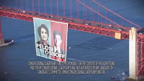 An image of Jon Ossoff on the Golden Gate Bridge replaced an image of him on a cable car after San Francisco officials threatened to sue a conservative super PAC.