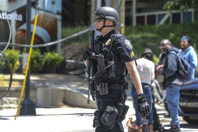 Atlanta police and a multi-jurisdiction police force swarmed midtown Atlanta on May 3 after five people were shot by an active shooter. (John Spink / John.Spink@ajc.com)

