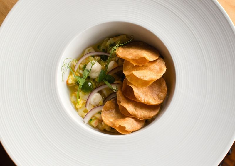 Shrimp ceviche at Better Half in West Midtown is served with aji amarillo and house-made crispy tortillas. CONTRIBUTED BY HENRI HOLLIS