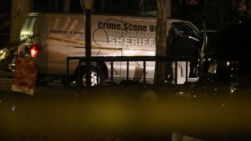 Authorities were preparing to search the Douglasville apartment where 75-year-old Florene Duke was found dead and hog-tied earlier in Monday evening. (BEN GRAY / BGRAY@AJC.COM)