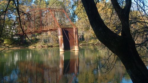 A file photo of the historic Jones Bridge. These remnants of the bridge collapsed into the Chattahoochee River on Thursday, Jan. 25, 2018. AJC FILE PHOTO
