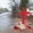 A memorial for University of Georgia football player Devin Willock and UGA football staff member Chandler LeCroy at the site where their automobile crashed on Barnet Shoals Road on Jan. 19, 2023, in Athens, Georgia. Willock and LeCroy died from their injures. (Jason Getz/The Atlanta Journal-Constitution/TNS)