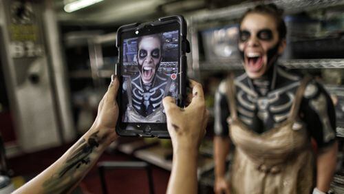 Elissa Danshaw is photographed by her makeup artist Carole Soueidnn backstage at Halloween Horror Nights at Universal Studios. (Robert Gauthier/Los Angeles Times/TNS)